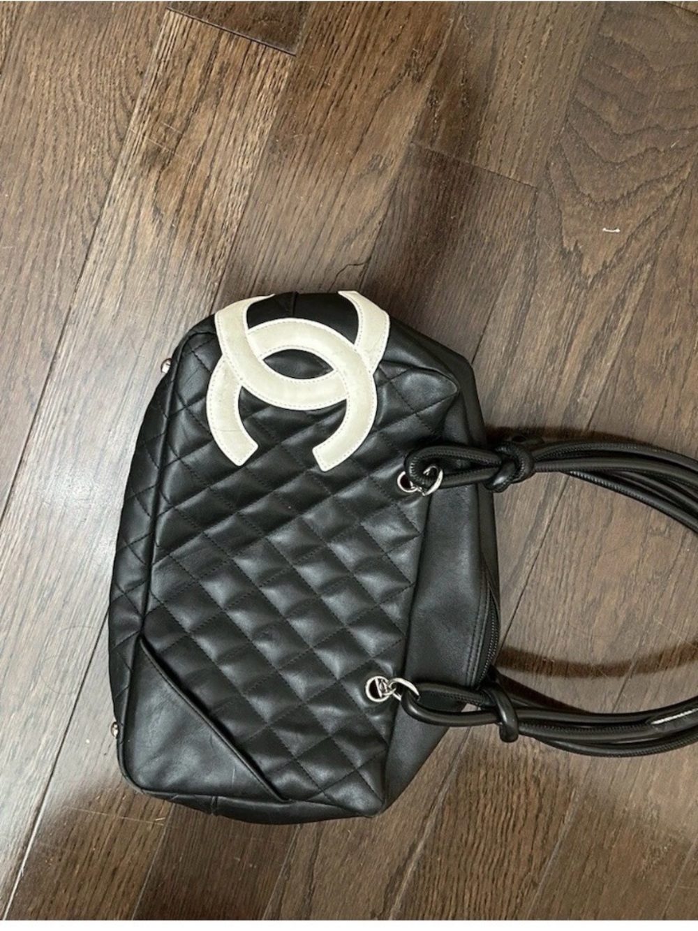 CHANEL Black Quilted Shoulder Bag with White Logo